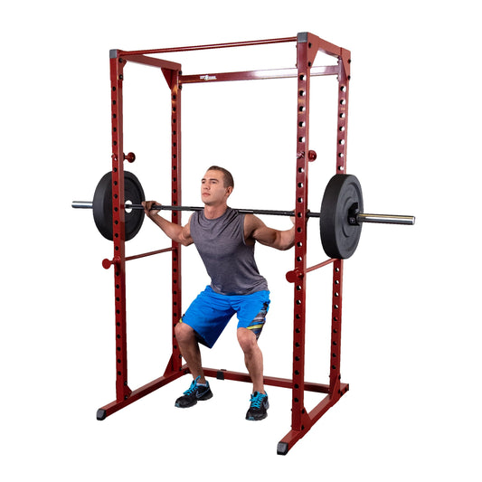 Body-Solid Best Fitness Power Rack - 14-Gauge Steel Home Gym with 500lb Capacity, Chin Bar, 23 Adjustable Safety Bars, Optional LAT & Dip Attachments, Red