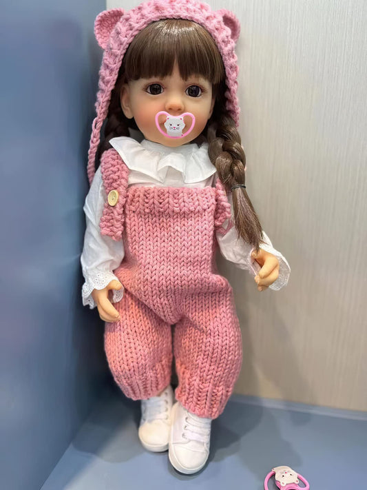 TERABITHIA 22 Inches Long Brown Hair Vinyl Full Body Anatomically Correct Lifelike Reborn Baby Doll Realistic Newborn Toddler Girl Dolls in Pink Woolen Set